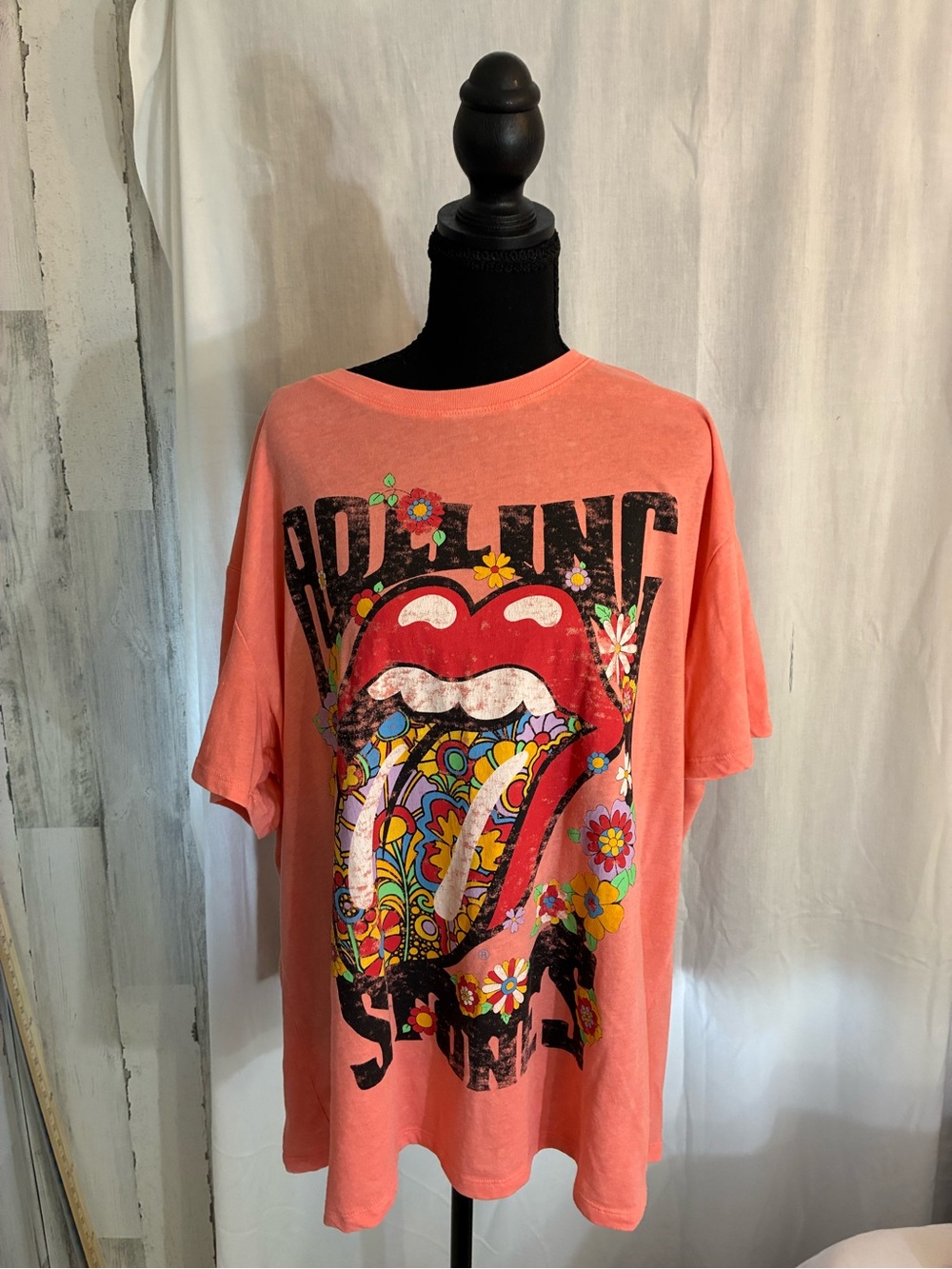 the Rolling Stones Coral Kids Tee with Floral Psychedelic Tongue Graphic